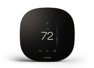 Modern digital thermostat displaying a temperature of 72°F.