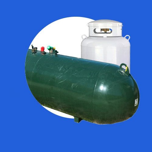 Two gas cylinders, one large green and one small white, on a blue background.