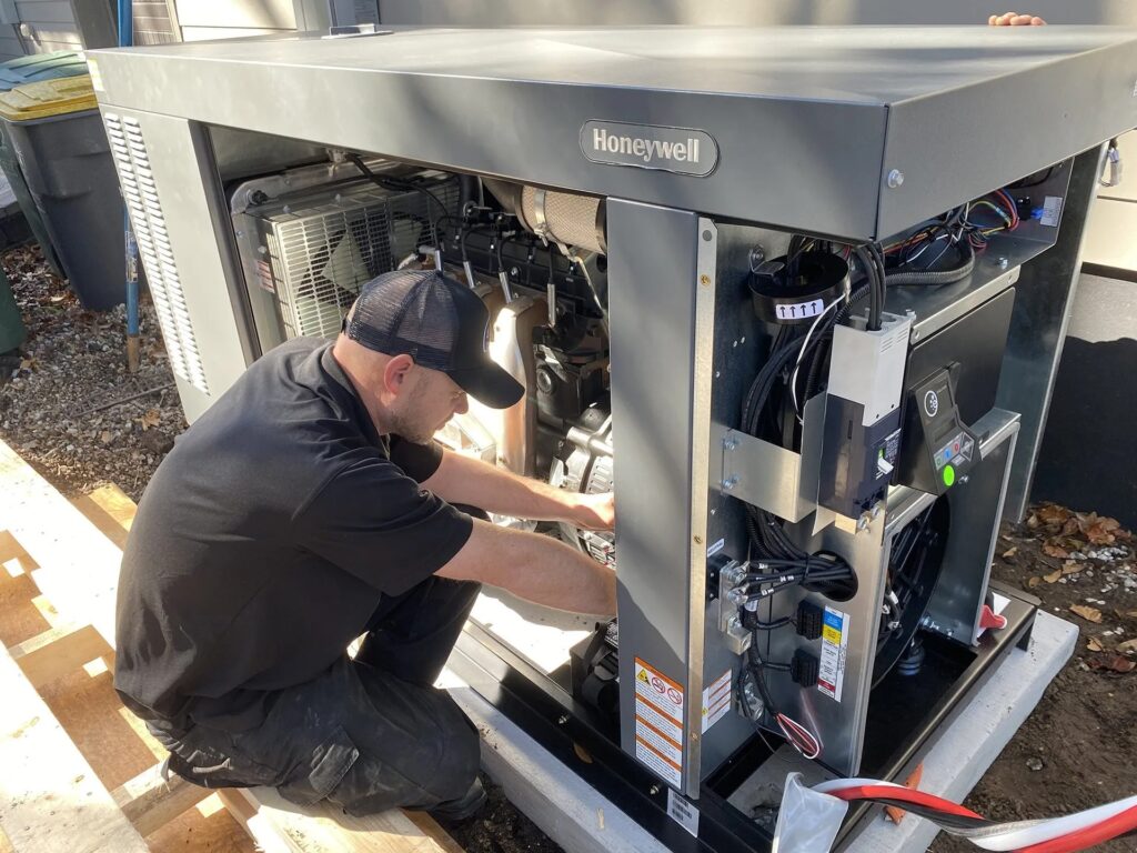 Technician repairing an HVAC unit outdoors.